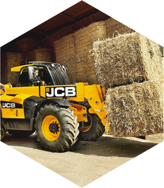 Manutention marque JCB, transport des bottes de foin